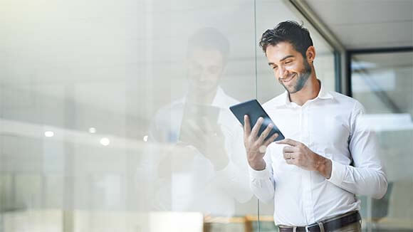 smiling-man-on-ipad