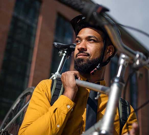 man holding bike